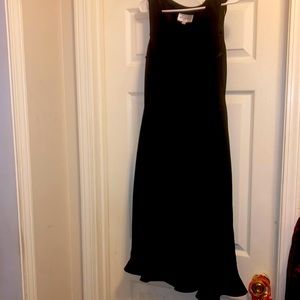 designer studio Black Dress Is knee-high It’s made of polyester